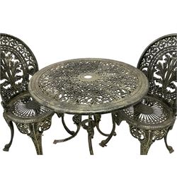 Cast metal garden set - circular table with pierced foliate decoration on triform base (W70cm H65cm); and pair matching chairs with arched pierced back and acanthus leaf motif, raised on cabriole supports, in silver green finish (W40cm H86cm)