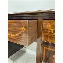 Edwardian mahogany desk, the inset top over three drawers and two cupboards with satinwood inlay 