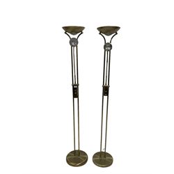 Two bronze finish metal uplighters, with adjustable reading lamps