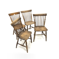 Matched set four elm spindle back dining chairs, with saddle seats, raised on turned supports and stretchers 