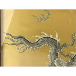 Chinese silk work panel embroidered in relief with a dragon, framed 47cm x 27cm