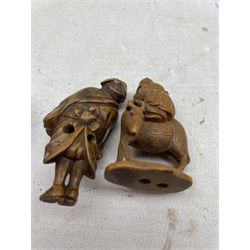 19th century Japanese boxwood netsuke in the form of a man playing the flute and riding on a deer, H4cm, another of a standing figure and another of a Noh mask