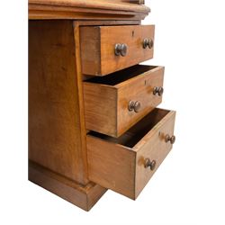 Victorian mahogany roll-top knee-hole desk, roll-top enclosing fitted interior with maple correspondence drawers and pigeonholes, sliding writing surface with adjustable central panel, fitted with six graduating drawers