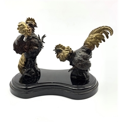 After P J Mene: Pair of bronze fighting cockerels on a marble base H18cm x W26cm 