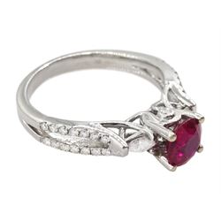 18ct white gold three stone round cut ruby and pear cut diamond ring, with diamond set gallery and two row diamond set shoulders, hallmarked, ruby approx 0.85 carat