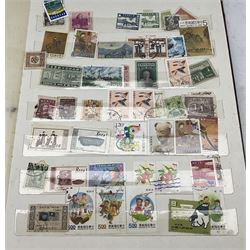 Predominantly Chinese stamps including various 1980s examples, overprints etc, housed in a stockbook/album