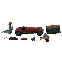 Tinplate clockwork toys to include a Seal with spinning ball, Yone, Japan, Circus Plane, D.R.G.M Frog, racing car and other items including a Will's Woodbines tinplate football game, Schuco clockwork mouse etc (7)