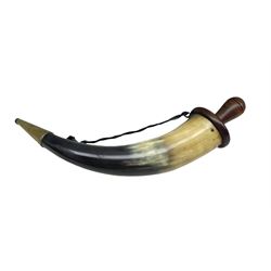 Early 19th century powder horn, the brass nozzle engraved 'W.D. and with Admiralty arrow and wooden end cap length approx. 35cm.  See 'Nelson's Navy' by Lavery page 177 illustrating a similar powder horn used on Nelson's ships.    Formerly the property of Sir Robert Craven 