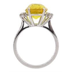 18ct white gold oval yellow sapphire and six stone round brilliant cut diamond cluster ring, hallmarked, sapphire approx 8.60 carat