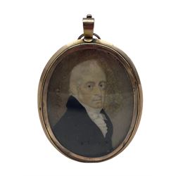 19th century oval head and shoulders miniature portrait on ivory of a gentleman wearing a black frock coat and white stock in gilt frame with hair panel to the reverse 6.5cm x 5cm
