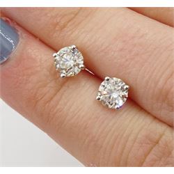 Pair of 18ct white gold round brilliant cut diamond stud earrings, total diamond weight 1.45 carat