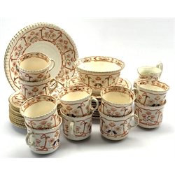  Victorian tea set decorated in the Art Nouveau style with stylized floral borders comprising ten cups, eleven saucers, ten plates, milk jug, slop bowl and two cake plates  
