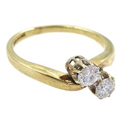 9ct gold two stone round brilliant cut diamond crossover ring, London import marks1994, total diamond weight approx 0.30 carat