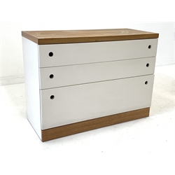 Mid 20th century teak and white chest fitted with three long graduated drawers w100cm, H44cm, D75cm