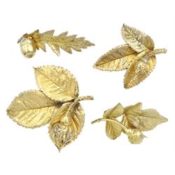 Four Danish silver-gilt rose bud and acorn brooches by Flora Danica brooches, all stamped