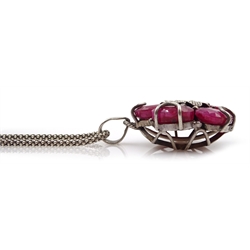 Silver faceted ruby flower pendant on silver chain, both stamped 925
