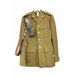 R.A.O.C four pocket khaki service tunic with parachutist badge, Sam Browne belt and khaki trousers