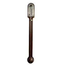 A replica 20th century cistern bulb stick barometer in the 18th century style, with a round topped mahogany case and visible cane, circular domed cistern cover and silvered register with a single Vernier, register engraved with recording scale and weather predictions, red spirit thermometer recording the temperature in degrees Fahrenheit and Celsius.  




£60-80
