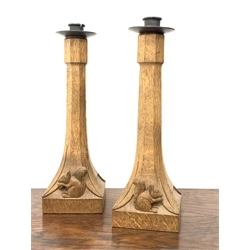 Pair 'Squirrelman' Yorkshire oak candlesticks of tapered octagonal form with square bases and caved with squirrel signature, H32cm
