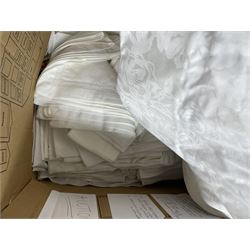 Two boxes of fabric to include Osborne and Little Volterra, El Paso fabric, tapestry cushion covers, curtains, table linen,  buttons, Quantity of decorative upholstery trims, cotton throw with tasselled edges and a pair of vintage striped curtains, other accessories (quantity)
