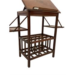 Edwardian walnut Canterbury music stand, hinged ratchet top, the sides with drop-down shelves, three division Canterbury base, with all-over reeded decoration