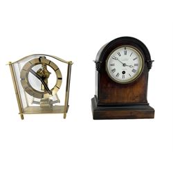 An English early 20th century mahogany 8-day mantle clock with a French timepiece movement and  enamel dial inscribed 