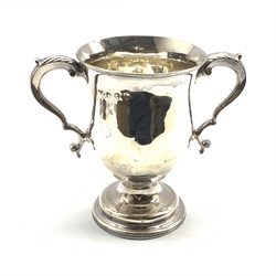 George III silver two handled loving cup of baluster form with leaf capped scroll handles and pedestal foot H14cm London 1817 Maker possibly John Scofield 10.9oz