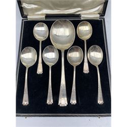 Cased set of six silver dessert spoons and serving spoon with reeded stems Birmingham 1933 Maker A J Bailey 8.8oz