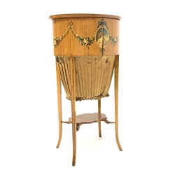 Edwardian satinwood Sheraton revival work table, hand painted with floral and husk garlands and oval portraits, oval form with hinged top and upholstered bag beneath, square tapering out splayed supports connected by shaped undertier, 39cm x 30cm, H72cm (a/f - front split)