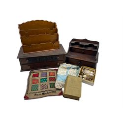 Early 20th century haberdashery counter top display drawers, one drawer labelled 'Sewing Machine Needles' W38cm 1887 unframed sampler, desk tidy, letter rack, 19th century ivory needle case, various buttons, 19th century mother-of-pearl gaming counters and other sewing related items in one box