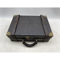 A Holland and Holland brass mounted oak and leather cartridge magazine with Holland and Holland 98 New Bond Street trade label, four dividers and five leather lifters and leather straps, 41cm x 30cm x 13cm