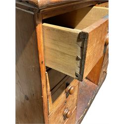 Early 19th century pine clerks desk, sloped writing top, eleven drawers