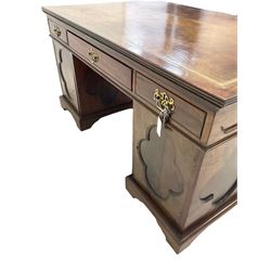 19th century and later mahogany partners desk, moulded rectangular top with leather inset decorated with Greek key border, the top fitted with three drawers to each side, each pedestal fitted with three drawers and cupboard, with quatrefoil panelled doors and sides, raised on bracket feet Provenance:  3rd Earl of Feversham