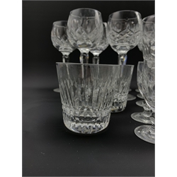 Waterford Lismore pattern drinking glasses comprising nine hock glasses, two large wine glasses, seven smaller wine glasses, three further stem glasses, together with five Waterford sherry glasses and five crystal tumblers, probably Waterford Lismore Diamond pattern, not marked 