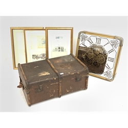 French architectural framed prints, an early 20th century suitcase, cog wall clock with quartz movement and a mirror