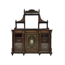 Late 19th century inlaid ebonised mirror back sideboard, the amboyna bordered with ebony and boxwood stringing, the shaped pediment pierced and flanked by finials over three graduating mirrors topped with shelves, the lower section with marquetry design rinceaux patterns, fitted with central panelled cupboard with inset Sevres design porcelain panel, surrounded by gilt metal mounts in garland and ribbon decoration, the door inlaid with geometric walnut banding, two glazed doors to either side, each flanked by columns with gilt metal Corinthian capitals and egg and dart bases, raised on tapered bun feet