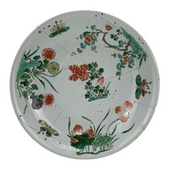 18th century Chinese Famille Rose charger, painted with butterflies amongst lotus, prunus, peony and chrysanthemum, D38.5cm