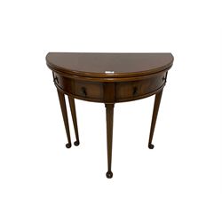 Hunter & Smallpage of York - Georgian design mahogany demi-lune table, the fold-over top supported by gate-leg action, fitted with single drawer and one faux drawer, raised on tapered supports with pad feet