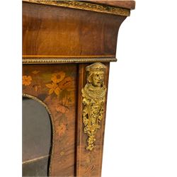 Late 19th century walnut pier cabinet, rectangular top over frieze inlaid with floral marquetry decoration, the door glazed with shaped rectangular panel, uprights topped with mounted gilt metal figures over castle motif and foliate inlay, raised on shaped plinth base