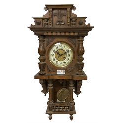 German oak cased 8-day striking wall clock c1910.