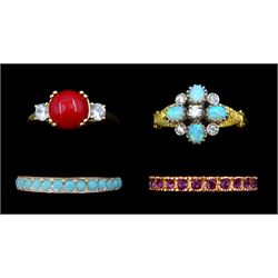 Four silver and silver-gilt stone set rings including opal and cubic zirconia, all stamped