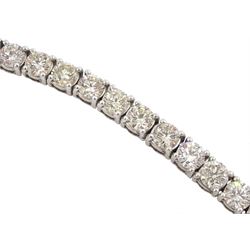 18ct white gold round brilliant cut diamond bracelet, stamped 750, total diamond weight 7.00 carat