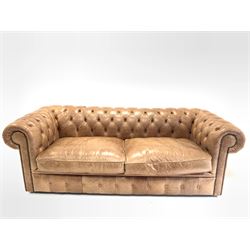 Chesterfield three seat sofa, upholstered in deep buttoned and studded tan leather W213cm