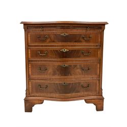 Georgian design mahogany serpentine Bachelor's chest, moulded and cross banded top over slide and four graduating drawers, canted and fluted upright corners, on bracket feet