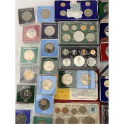 New Zealand proof coins and sets including 1977, 1978, 1979 and 1980 seven coin sets each including sterling silver dollar, other year sets, various commemoratives in cupronickel etc, housed in a cash tin
