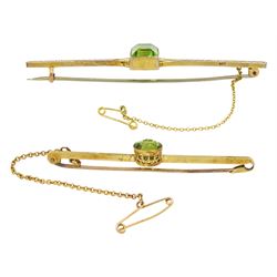 Early 20th century gold baguette cut peridot brooch, stamped 9ct and one other gold round peridot brooch, stamped 15ct, boxed