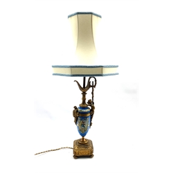 Continental Porcelain table lamp in the form of a ewer decorated with figure panel on a blue ground with gilt metal mounts H55cm