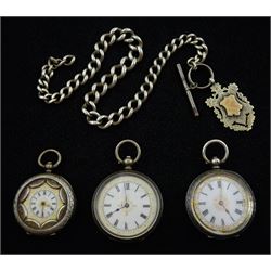 Three early 20th century silver cylinder ladies pocket watches and a silver tapering watch chain with fob