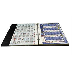 Queen Elizabeth II mint decimal stamps, Royal Mail Smilers most being first class, face value of usable postage approximately 630 GBP, housed in a ring binder 