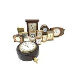 Late 19th/ Early 20th century Ships clock in oak rope twist case, with painted white enamel dial with Roman chapter and subsidiary seconds ring, (D22cm) together with a tray of mainly quartz clocks